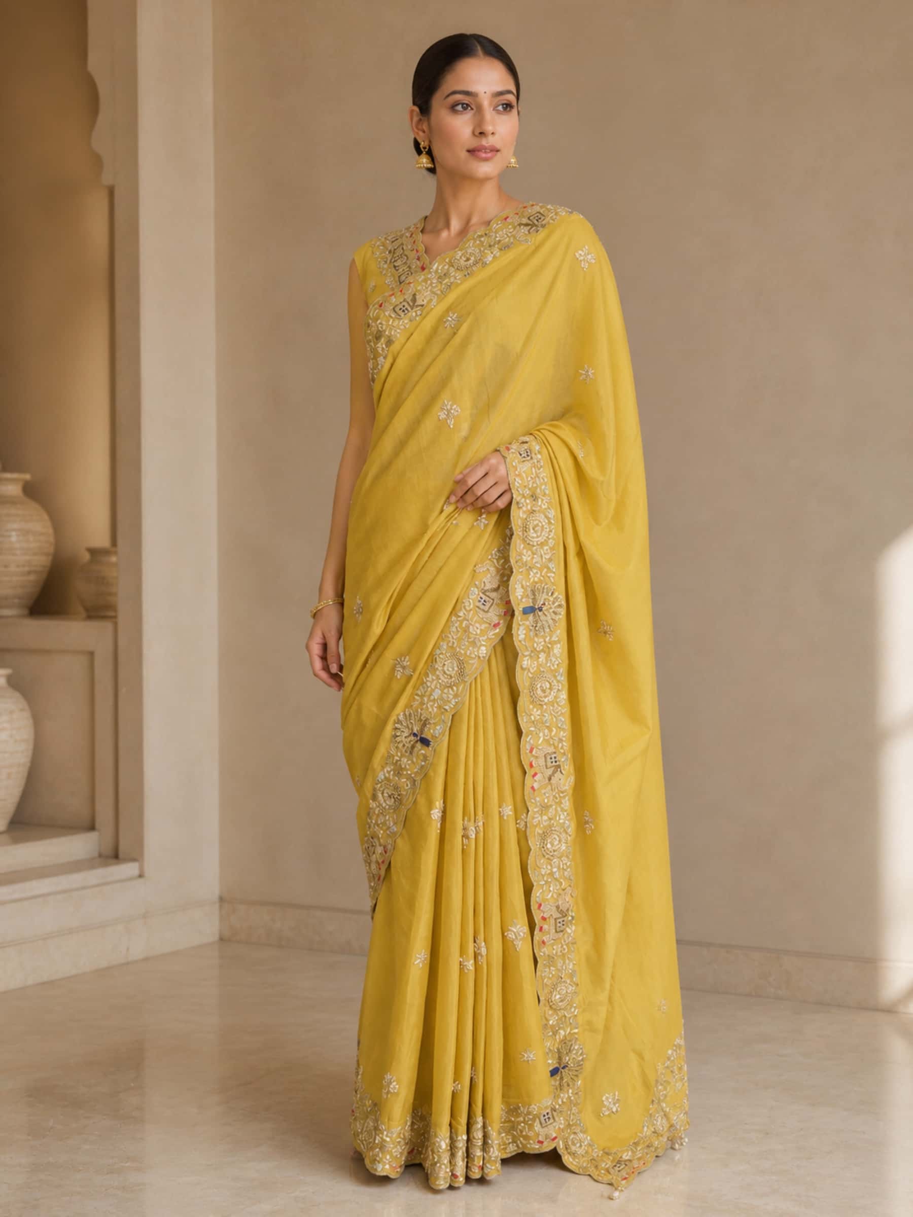 Golden Peacock and Elephant Zardozi Tissue Saree