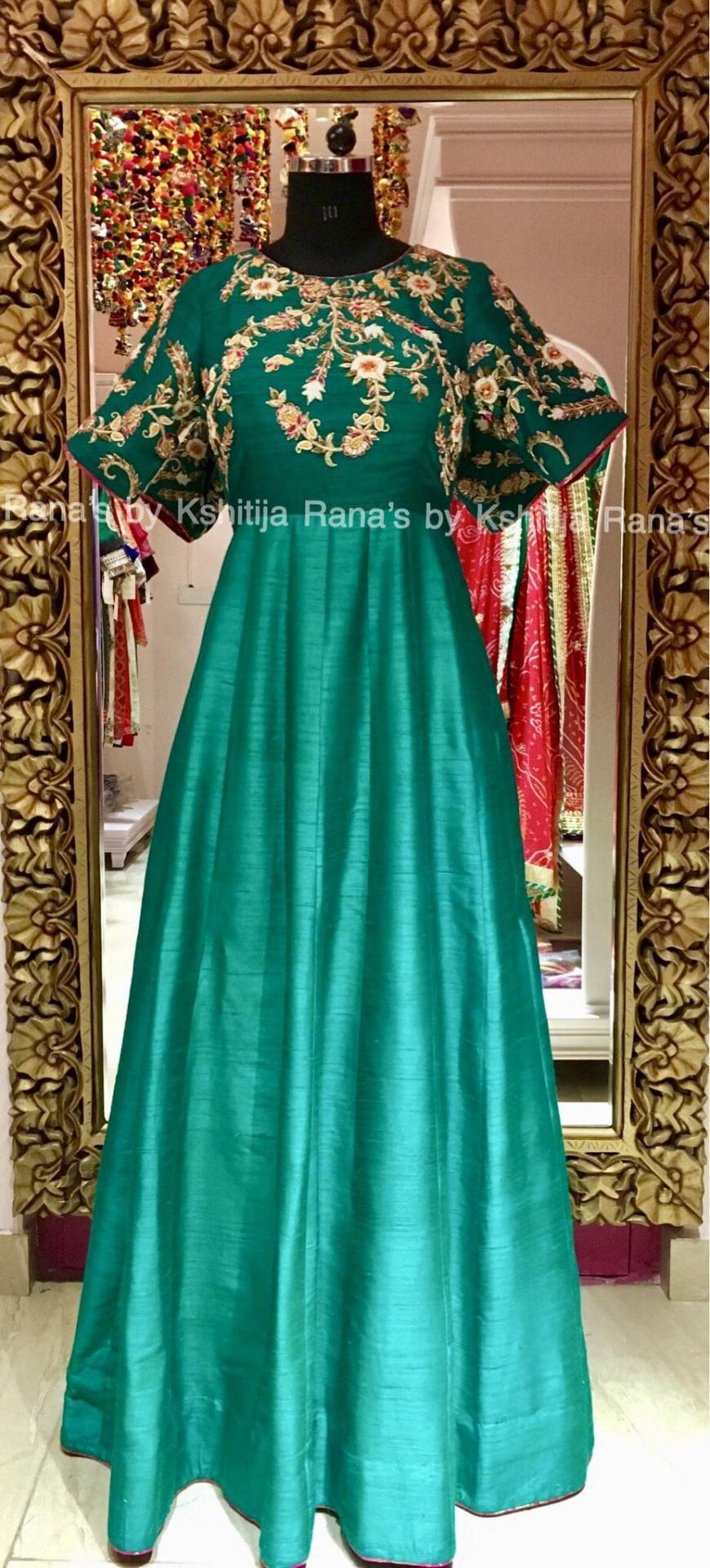 Regal floral length dress in emerald green gown