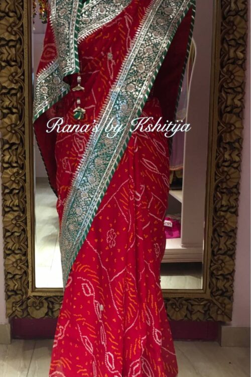 Red Rai Bandhej Saree in Fine Gota Work Design